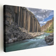 Vibrant landscape canvas print depicting dramatic canyons in rich hues of orange and red, showcasing textured details and an expansive side view, perfect for home decor.