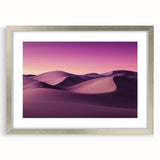 Elegant silver-framed landscape artwork depicting a tranquil desert scene, featuring soft hues of beige and gold, complemented by a white mat. Perfect for enhancing home decor.