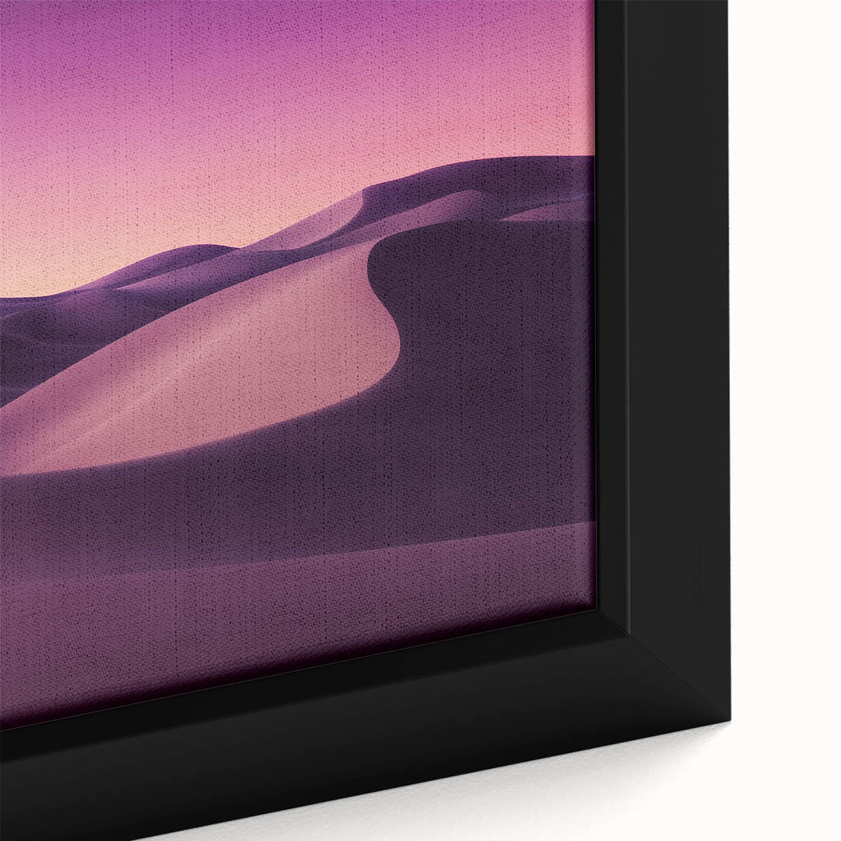 Close-up of a framed canvas artwork showcasing a vibrant desert landscape with warm hues of orange and yellow, perfect for home decor and desert-themed interiors.
