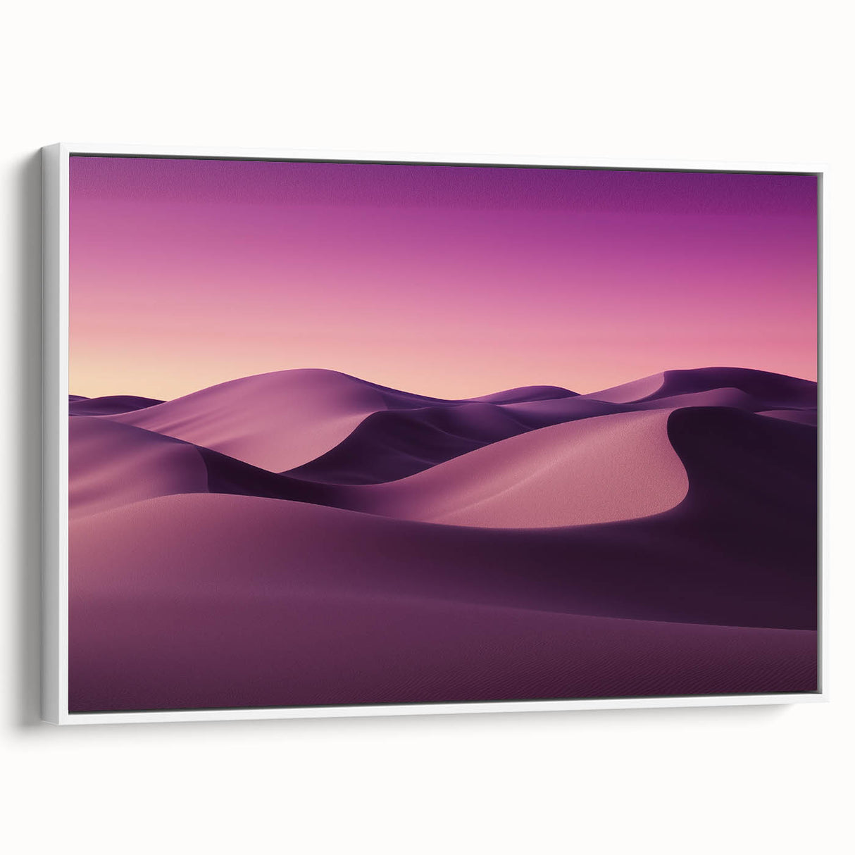 Framed canvas artwork showcasing a vibrant desert landscape with warm hues of orange and beige, set against a sleek white frame, perfect for modern home decor.