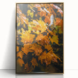 Large art print of a mid-century modernist autumn scene in gold and orange tones, framed in acrylic.