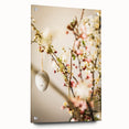 Large abstract wall art on acrylic glass depicting spring themes in vibrant green and soft pink.