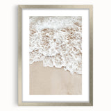 Textured abstract art print in silver frame, featuring soft gray and white swirls, ideal for modern bedroom ambiance.