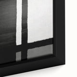 Close-up of framed abstract wall art featuring vibrant strokes in shades of blue, green, and gold, showcasing a modern artistic design perfect for home decor.