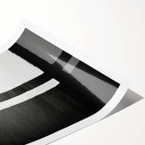 Abstract wall art print showcasing vibrant strokes in bold colors of blue, orange, and yellow, rolled and ready for display, ideal for modern home decor.