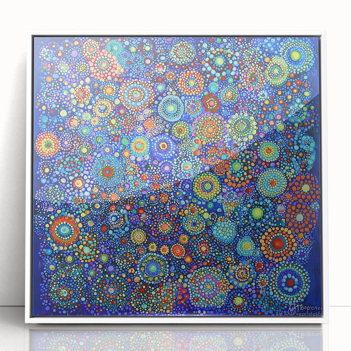 Framed acrylic artwork showcasing an abstract design with vibrant strokes in shades of blue, yellow, and red, perfect for modern home decor.