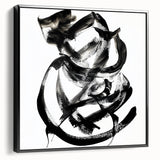Framed abstract canvas art showcasing dynamic black strokes on a white background, designed to enhance modern interiors and add artistic flair.