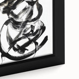 Close-up of a framed abstract canvas artwork featuring vibrant strokes in blue, yellow, and red hues, perfect for modern home decor or art enthusiasts.