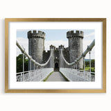 Elegant gold-framed landscape artwork showcasing a majestic castle surrounded by lush greenery, perfect for home decor or gallery display, highlighting intricate details and vibrant colors.