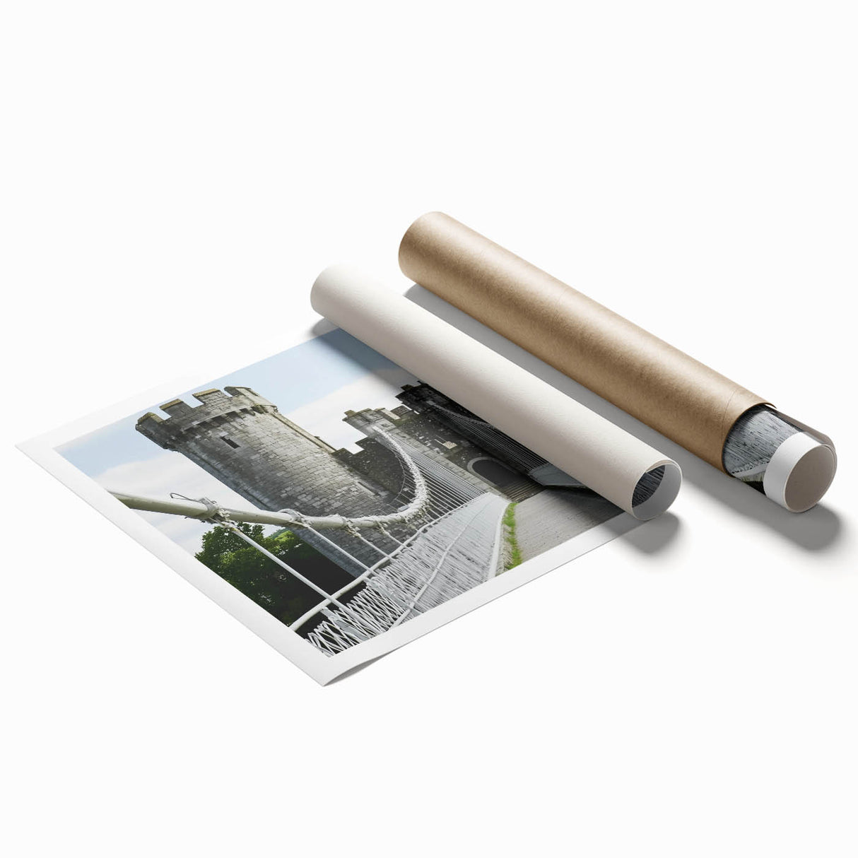 Rolled print displaying a vibrant landscape scene with a majestic castle set against a colorful sunset backdrop, securely packaged in a protective tube.