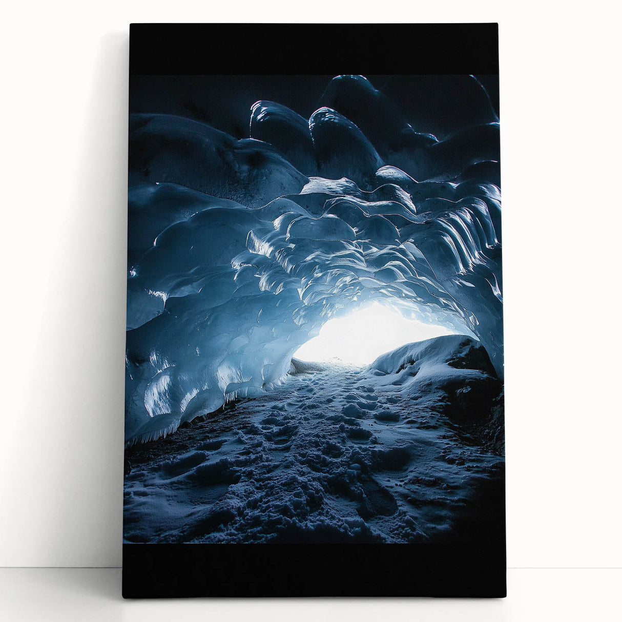 Stretched canvas artwork depicting an abstract landscape with cave formations, featuring rich earthy tones and a textured finish, ideal for modern home decor.