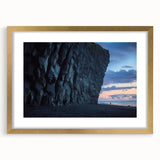 Golden-framed landscape artwork featuring dramatic cliffs and serene skies, elegantly matted for enhanced visual appeal, perfect for home decor.