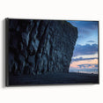 Framed canvas artwork showcasing a stunning cliff landscape in vibrant colors, featuring a sleek black frame, ideal for enhancing modern home decor aesthetics.