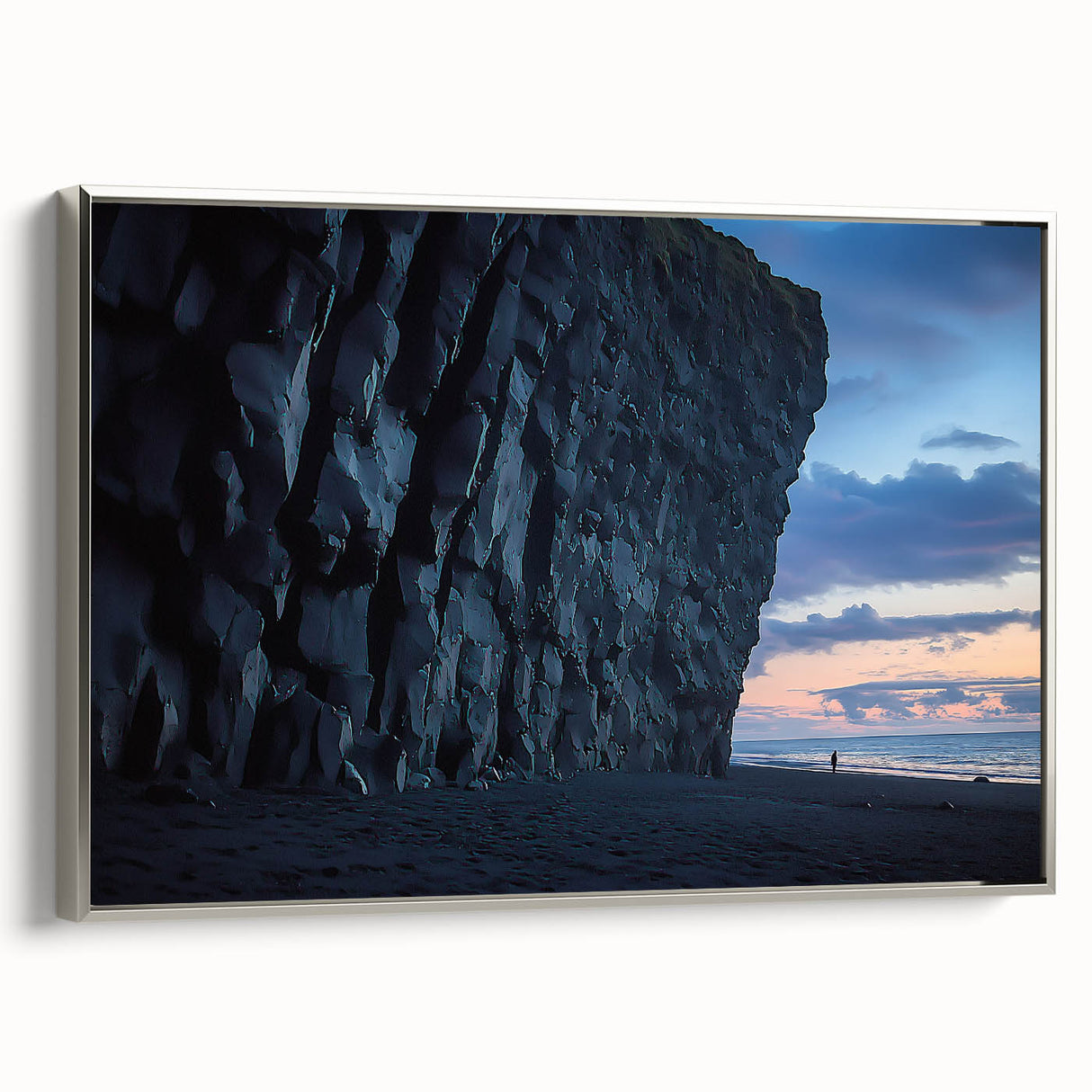 Framed canvas artwork depicting a stunning landscape of cliffs with a silver frame, showcasing intricate details and vibrant colors, perfect for modern home decor.
