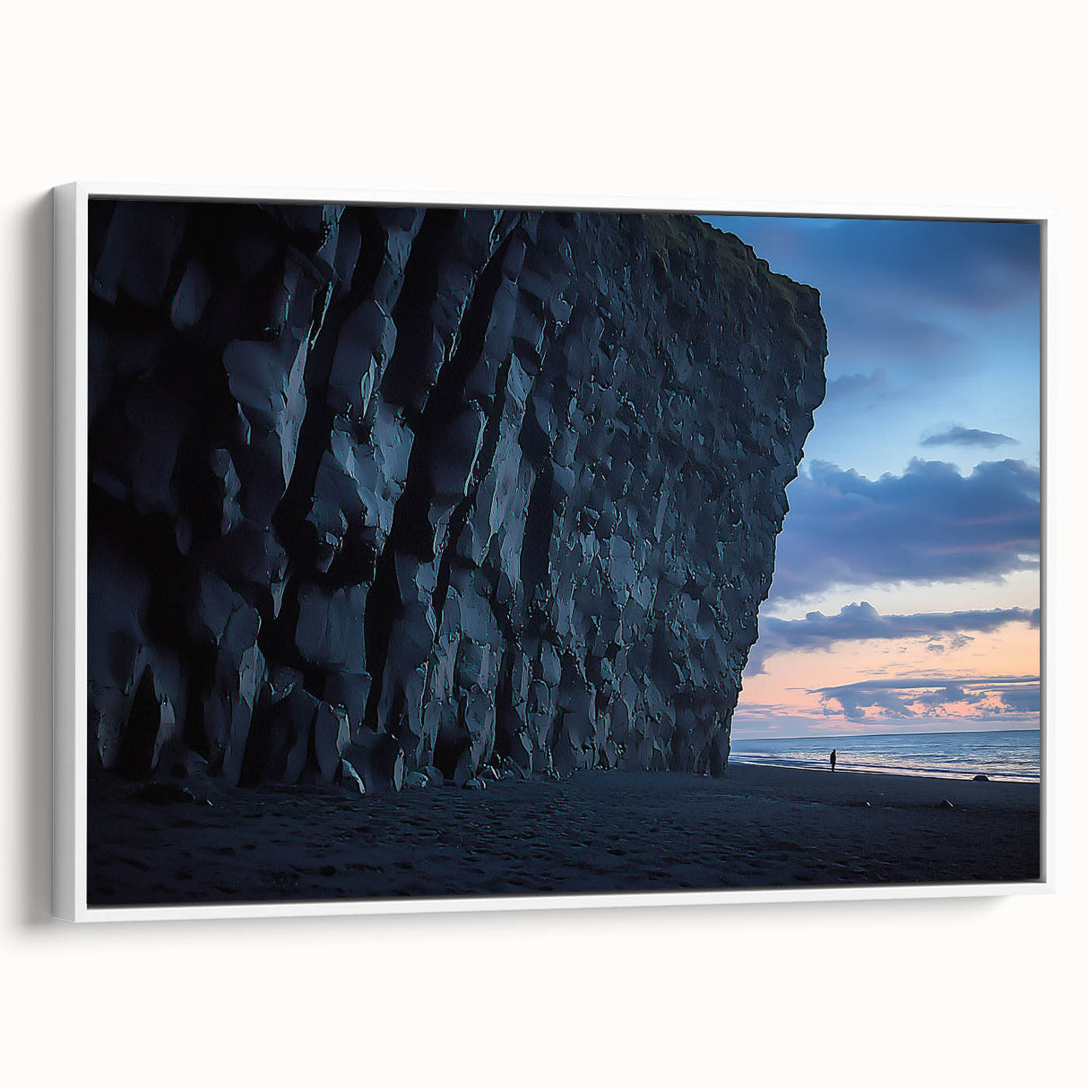 Framed canvas artwork depicting stunning cliffs and landscapes, with a white frame and side view showcasing its elegant design, perfect for home decor.