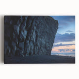 Stretched canvas artwork depicting a dramatic cliff landscape with vibrant colors, perfect for home decor, creating an adventurous atmosphere and enhancing interior aesthetics.