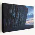 Stretched canvas artwork depicting dramatic cliffs against a vibrant sunset, showcasing rich colors and intricate textures, ideal for nature-inspired home decor.