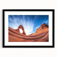 Black frame showcasing a landscape artwork of canyons, complete with a white mat, ideal for home decor, adding a modern touch to any room.