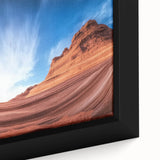 Close-up of a framed canvas showcasing a stunning landscape of vibrant canyons in rich earthy tones, perfect for home decor and nature enthusiasts.
