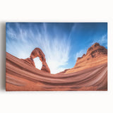 Stretched canvas artwork depicting a vibrant landscape of canyons at sunset, showcasing rich hues of orange, purple, and blue, perfect for home decor.