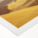 Desert landscape rolled canvas art showcasing vibrant hues of orange and yellow, capturing the serene beauty of arid terrains, ideal for home decor.