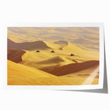 Desert landscape rolled canvas print showcasing vibrant hues of orange and yellow, capturing a serene sunset scene, elegantly packaged in a protective tube.