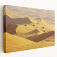Stretched canvas artwork depicting a vibrant desert landscape with warm colors and striking rock formations, ideal for home decor or art enthusiasts.