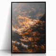 Large abstract wall art depicting fall season in warm orange and brown tones on a framed acrylic.