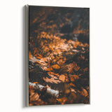 Framed canvas depicting a vintage-style landscape art painting with colorful autumn trees against a black background.