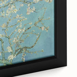 Close-up of a framed canvas featuring a textured, colorful abstract design in black tones, ideal for living room decor.