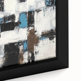 Close-up of a framed abstract canvas artwork showcasing vibrant blue and gold strokes on a textured surface, ideal for modern decor or art collection.