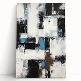 Abstract canvas art print featuring vibrant multicolored strokes and intricate textures, leaning against a neutral wall, perfect for modern home decor.