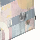 Abstract acrylic glass artwork showcasing vibrant strokes in shades of blue, gold, and white, emphasizing a modern artistic style ideal for contemporary decor.