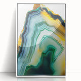 Framed acrylic artwork showcasing an abstract design of colorful strokes in varying shades of blue, orange, and yellow, perfect for modern home decor.