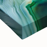 Abstract canvas artwork showcasing vibrant, multicolored strokes in a dynamic pattern. The close-up reveals the textured surface and rich details, enhancing the visual appeal for contemporary home decor. Perfect for art enthusiasts looking to elevate their living space with modern abstract designs.