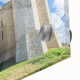 Close-up of a vibrant acrylic glass landscape artwork depicting a majestic castle surrounded by lush greenery, showcasing intricate details and vivid colors. Ideal for home decor enthusiasts seeking unique wall art inspired by nature and architecture.