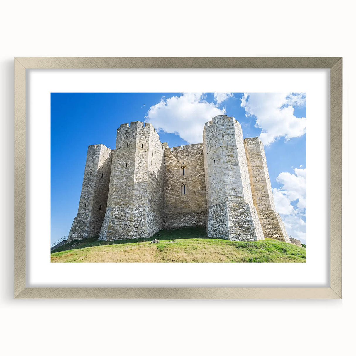 Elegant silver-framed landscape artwork featuring a majestic castle surrounded by lush greenery, designed with a classic mat for a sophisticated presentation.