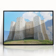 Framed acrylic artwork showcasing a scenic landscape with a castle, presented in a sleek black frame that enhances the vibrant colors and details of the image, perfect for home décor.