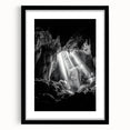 Framed landscape artwork depicting a serene cave scene, featuring a black mat and an elegant frame. Ideal for enhancing home decor with natural beauty.
