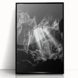 Framed acrylic artwork depicting a stunning cave landscape, featuring vibrant colors and intricate details, presented in a sleek black frame ideal for modern decor.