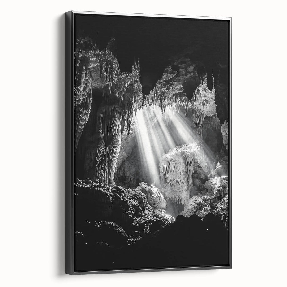 Framed canvas artwork depicting a serene landscape with intricate cave formations, featuring a sleek black frame, ideal for enhancing modern home décor. Perfect for art enthusiasts seeking nature-inspired themes.