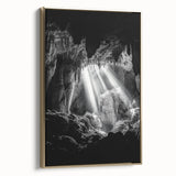 Framed canvas artwork depicting a stunning landscape with caves, showcasing rich golden tones and intricate details, perfect for home decor enhancement.
