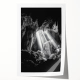 Rolled print showcasing a breathtaking landscape of vibrant caves, featuring rich earthy tones and intricate textures, packaged securely in a protective tube for delivery.