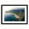 Framed landscape artwork showcasing dramatic cliffs with a black mat, emphasizing natural beauty and depth, ideal for home or office decor.