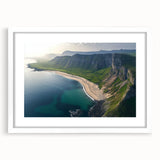 Framed landscape artwork depicting dramatic cliffs and serene waters, featuring a white mat and elegant framing, perfect for enhancing home decor.
