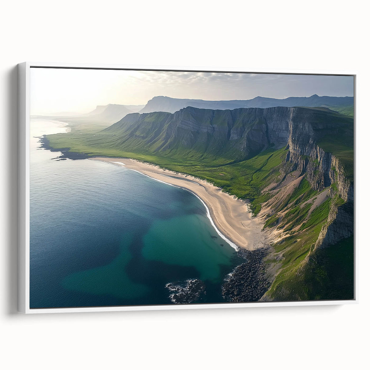 Framed canvas artwork depicting a dramatic landscape of cliffs at sunset, featuring vibrant colors and intricate details, set against a white frame for a modern touch.