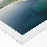 Vibrant rolled canvas artwork depicting dramatic cliffs and serene landscapes, showcasing rich colors and textures, ready for display in any home or office.