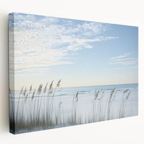 Stretched canvas artwork showcasing a serene beach landscape in vibrant colors, displayed from a side view, ideal for coastal home decor.