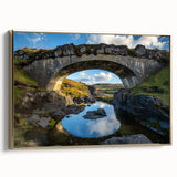 Framed canvas artwork depicting a landscape scene of a golden bridge, showcasing intricate details and rich colors, perfect for home or office decor.