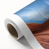 Vibrant landscape canvas print depicting majestic canyons in rich earth tones, rolled for easy transport, ideal for nature-themed decor in homes or offices.